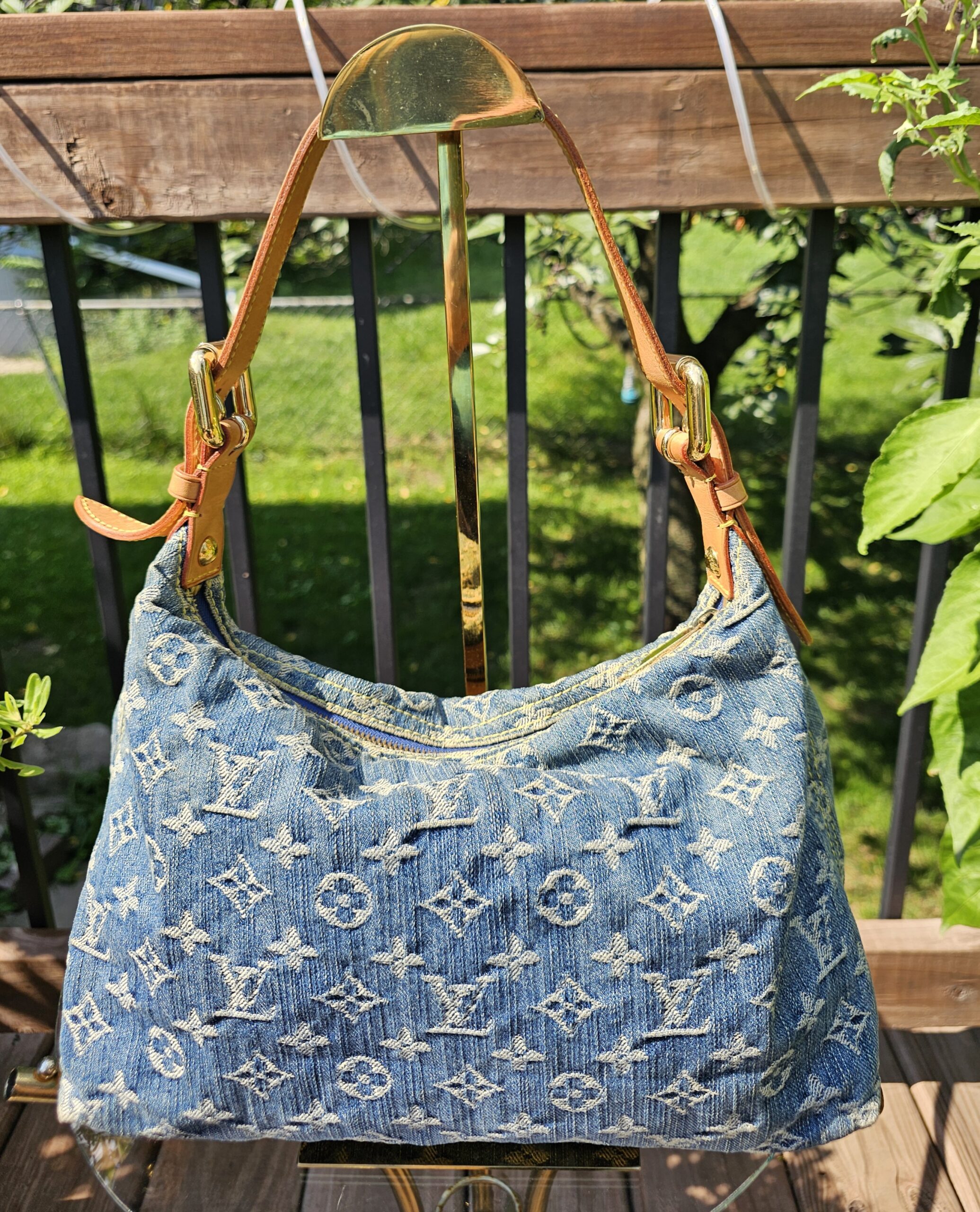 Back of the Louis Vuitton Monogram Denim Baggy PM showing the crisp blue Monogram denim pattern