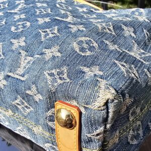 Close-up of the blue Monogram denim on the Louis Vuitton Baggy PM showing the crisp woven LV pattern
