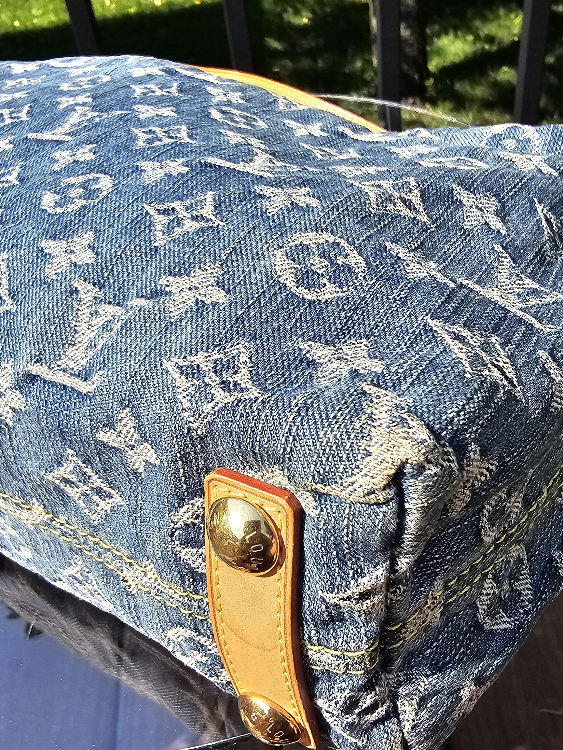 Close-up of the blue Monogram denim on the Louis Vuitton Baggy PM showing the crisp woven LV pattern