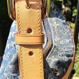 Gold-tone buckle on the adjustable strap of the Louis Vuitton Monogram Denim Baggy PM