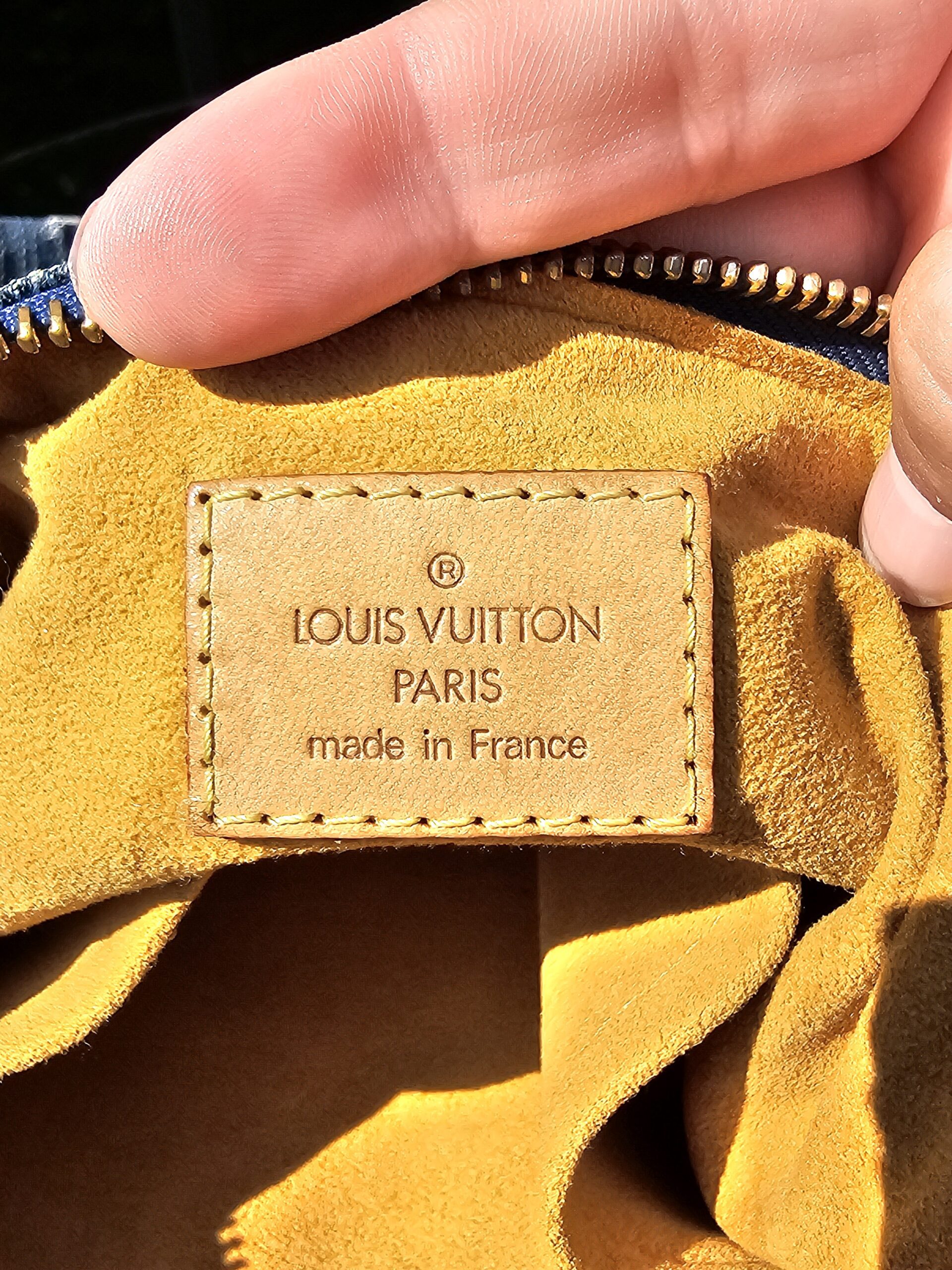Louis Vuitton Paris made in France heat stamp inside the Monogram Denim Baggy PM