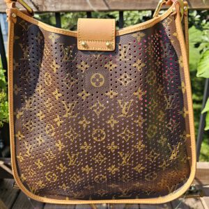 Back of the Louis Vuitton Monogram Perforated Musette in unperforated Monogram coated canvas
