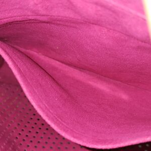 Fuchsia interior lining of the Louis Vuitton Monogram Perforated Musette