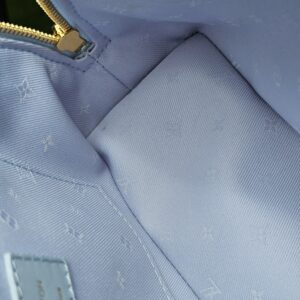 Monogram textile lining inside the Louis Vuitton Bubblegram Alma BB