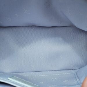 Interior slip pocket of the Louis Vuitton Bubblegram Alma BB