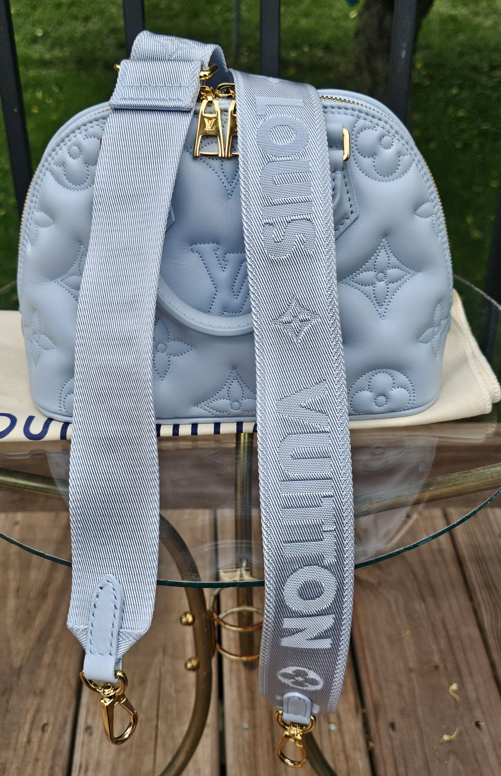 Wide Louis Vuitton jacquard strap included with the Bubblegram Alma BB
