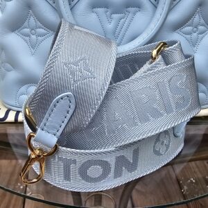 Louis Vuitton Bubblegram Alma BB in Ice Blue with the wide jacquard strap attached