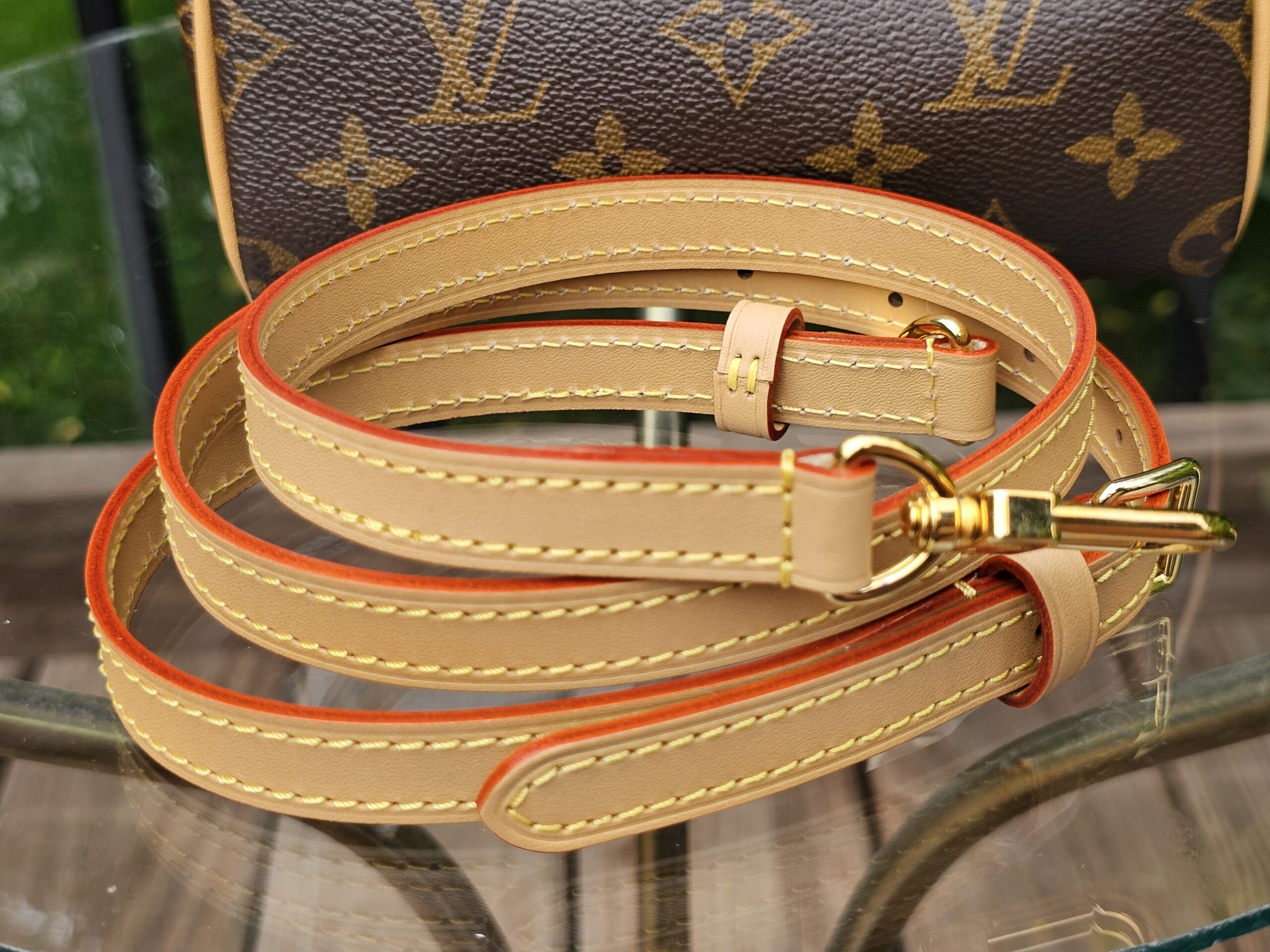 Removable adjustable strap for the Louis Vuitton Nano Speedy Bandouliere in natural vachetta leather with painted edges