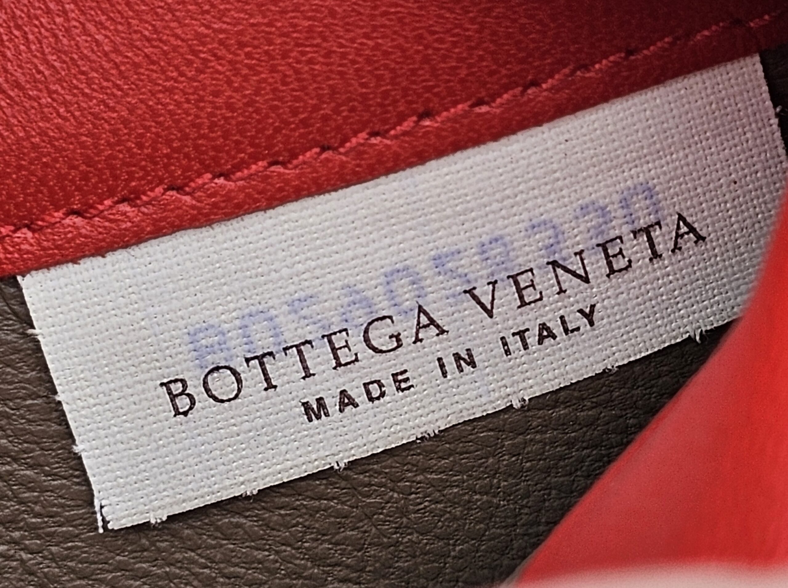 Bottega Veneta made in Italy fabric label sewn inside the continental wallet