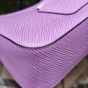 Close-up of the crisp purple Epi leather grain on the Louis Vuitton Marellini