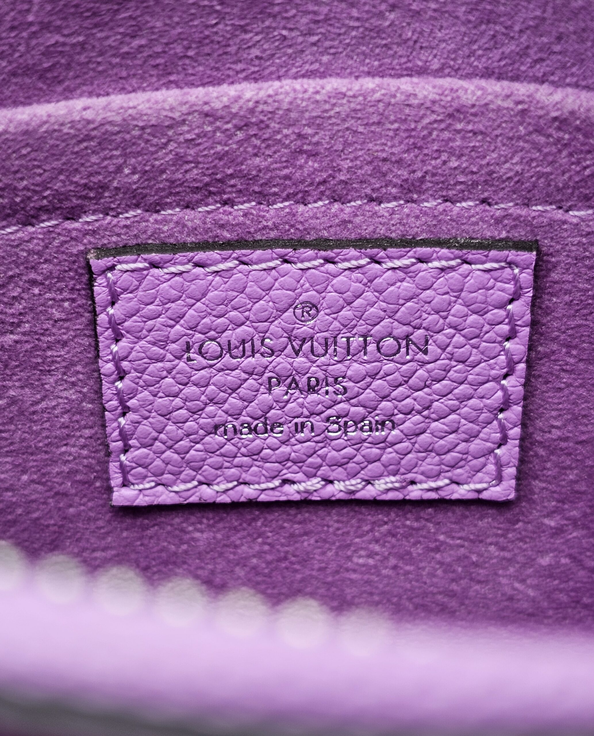 Louis Vuitton Paris made in Spain heat stamp inside the Epi Marellini