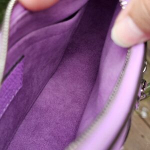 Purple microfiber lining inside the Louis Vuitton Epi Marellini