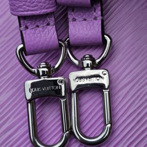 Close-up of the silver-tone strap clasps on the Louis Vuitton Epi Marellini