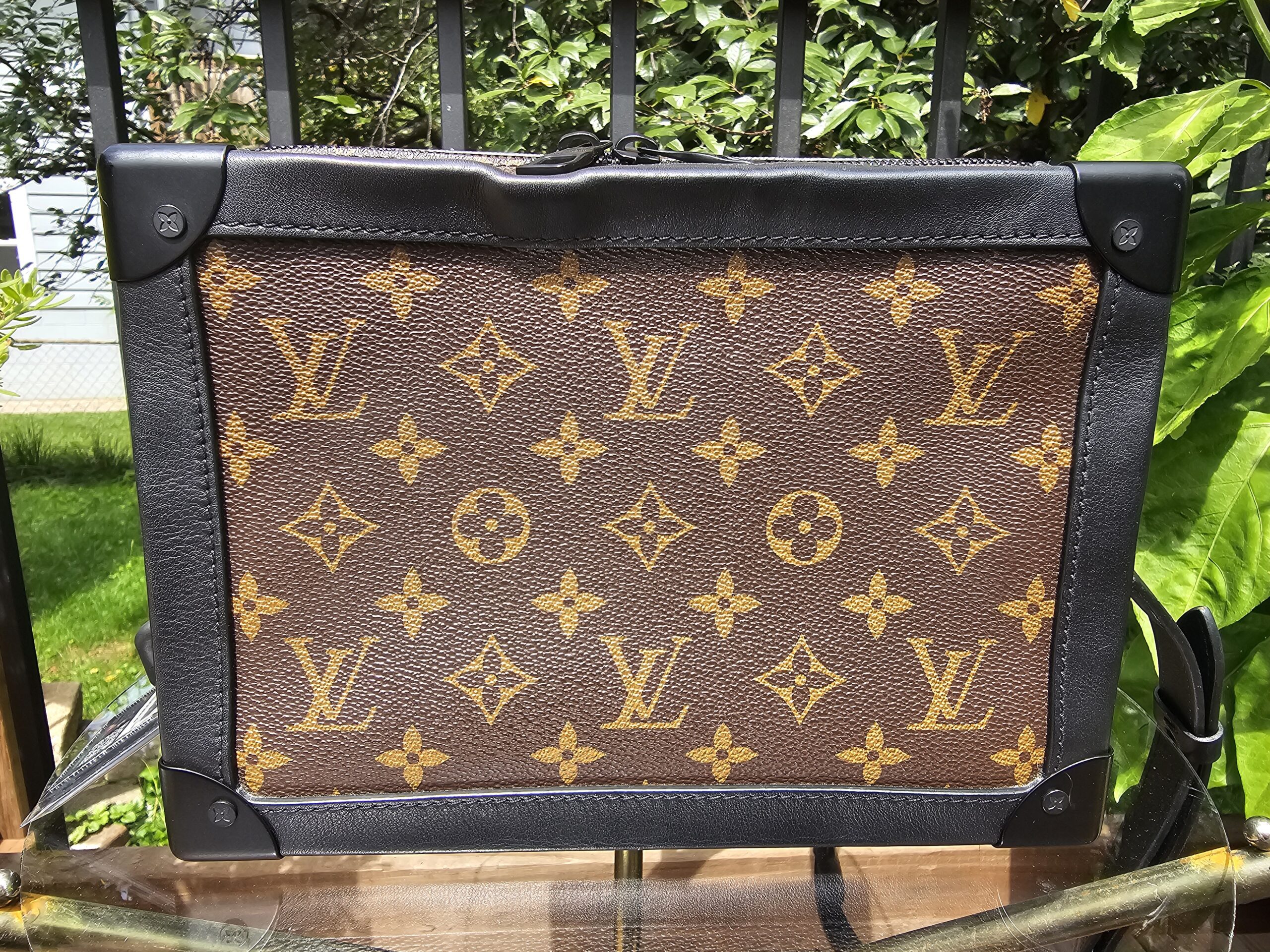 Front of the Louis Vuitton Monogram Solar Ray Soft Trunk showing the black corner protectors