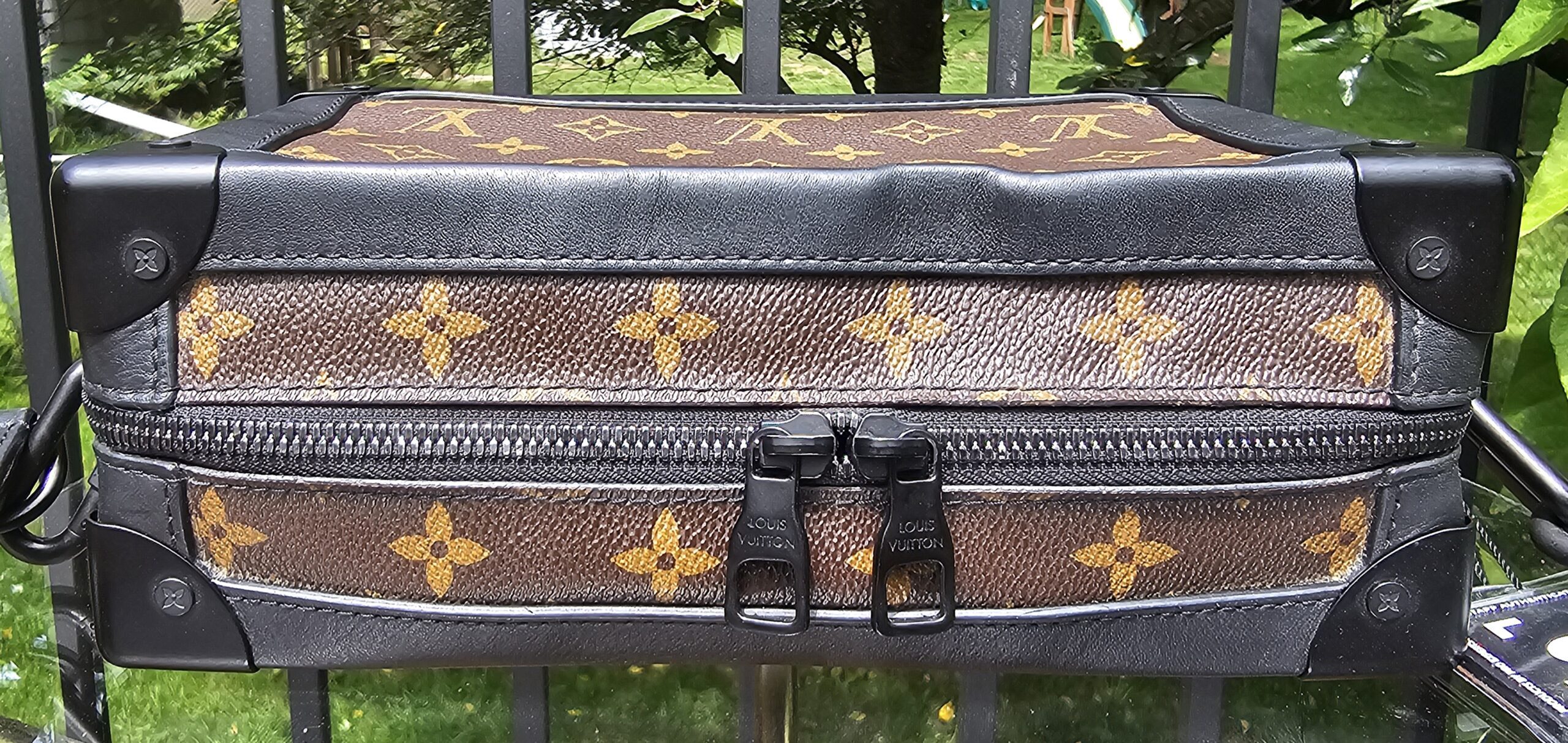 Two-way zip closure along the top of the Louis Vuitton Monogram Solar Ray Soft Trunk