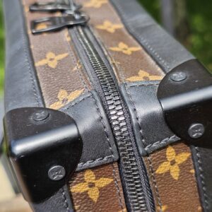Black corner protector and zip track on the Louis Vuitton Monogram Solar Ray Soft Trunk