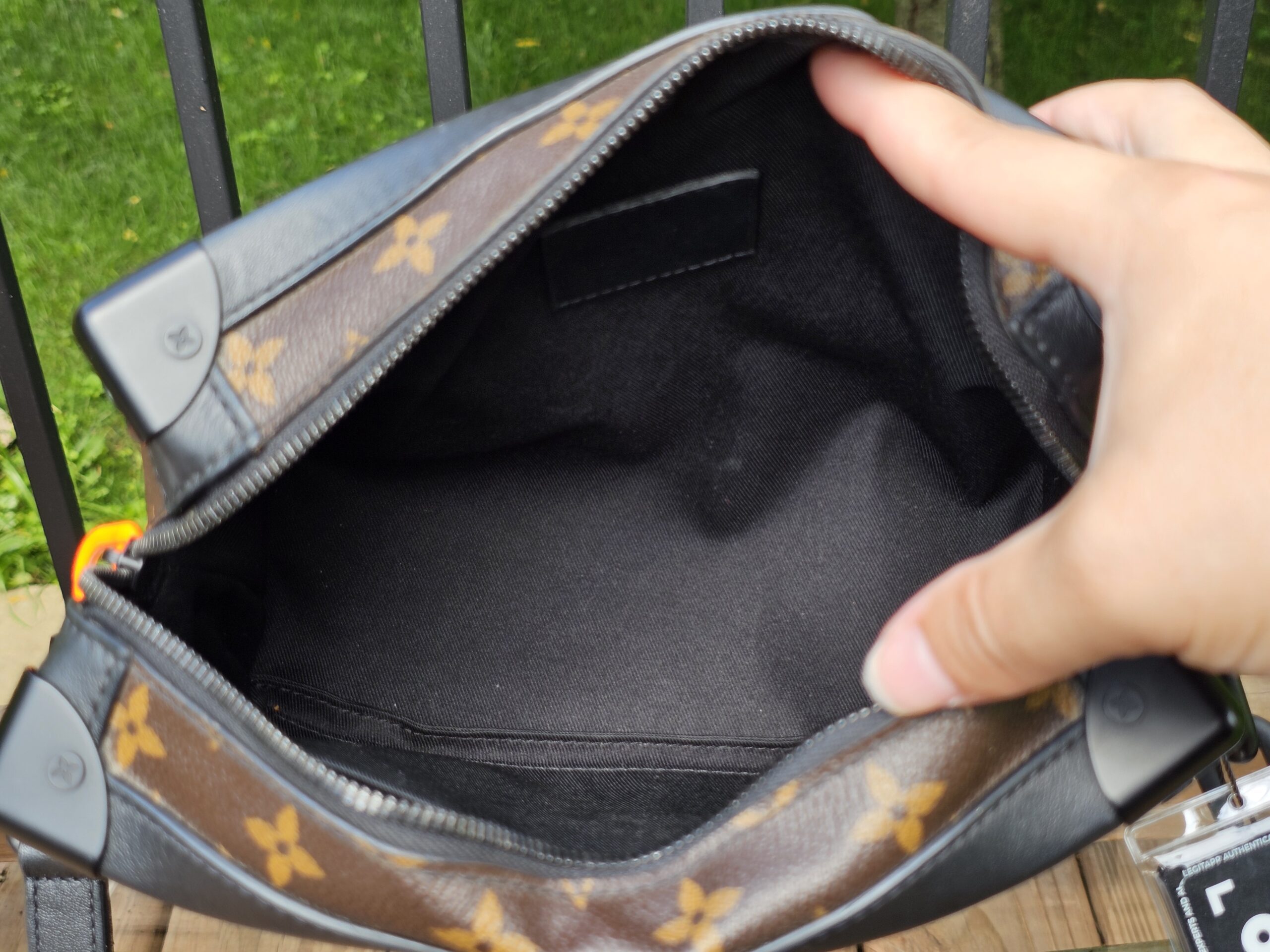 Black textile lined interior of the Louis Vuitton Monogram Solar Ray Soft Trunk
