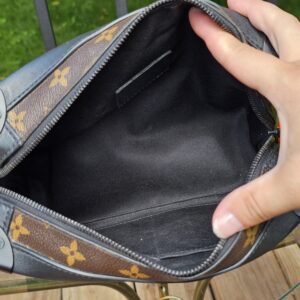 Interior flat pockets inside the Louis Vuitton Monogram Solar Ray Soft Trunk