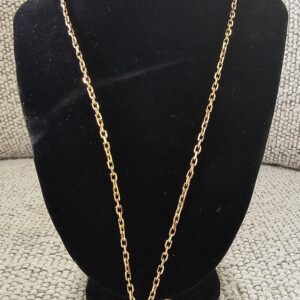 Louis Vuitton Lock Me heart necklace in burgundy resin displayed on a bust to show the chain drop