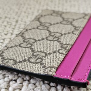 Pink calfskin card slots on the Gucci GG Supreme Essence card holder