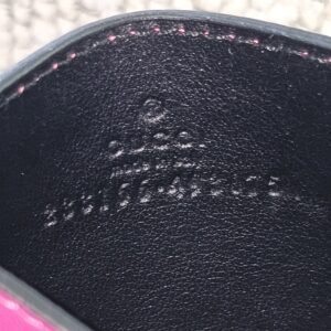 Gucci made in Italy stamp embossed inside the GG Supreme Essence card holder