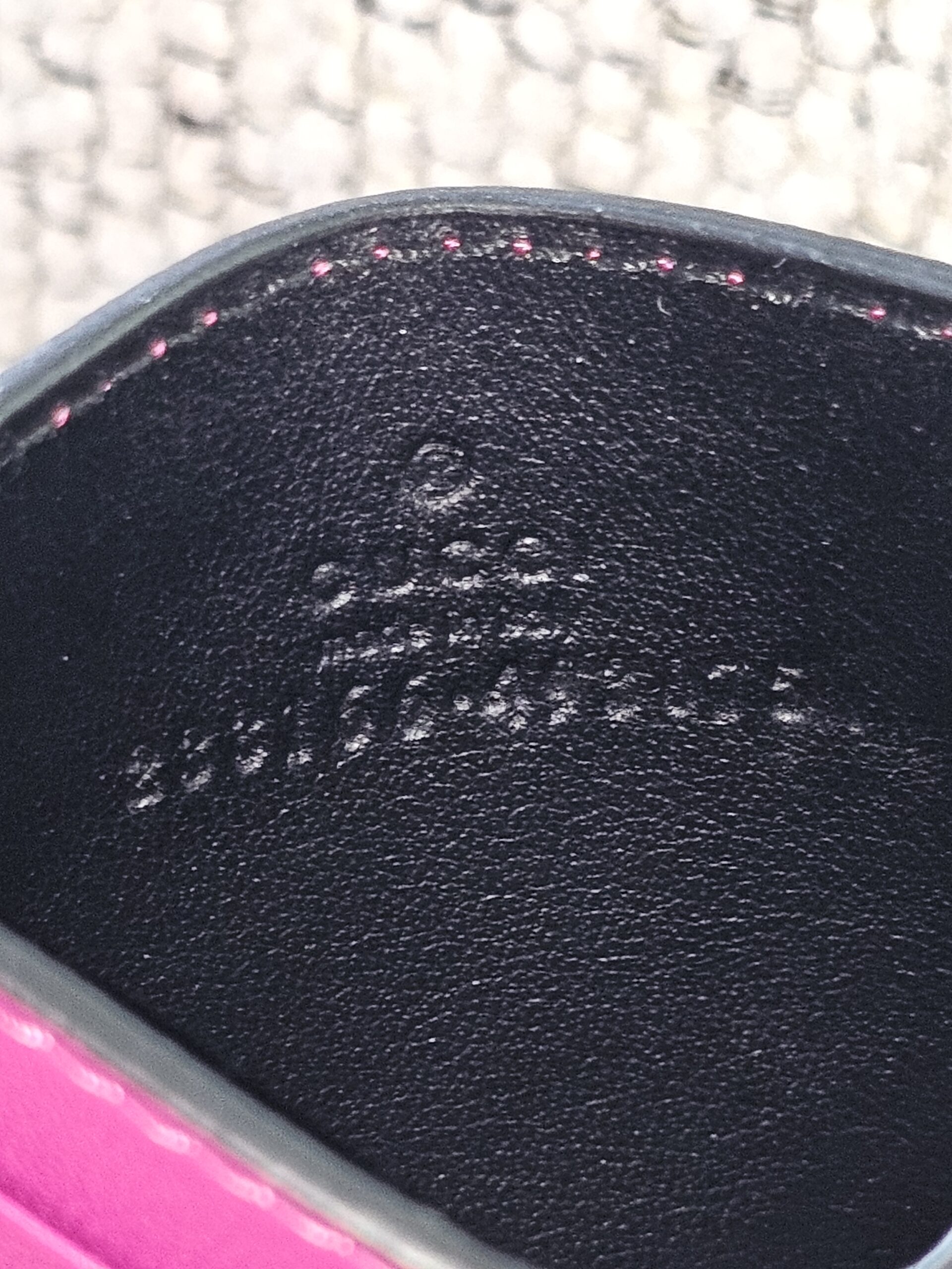 Gucci made in Italy stamp embossed inside the GG Supreme Essence card holder