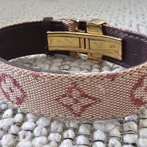 Gold-tone clasp and burgundy leather lining of the Louis Vuitton Millennium Wish bracelet