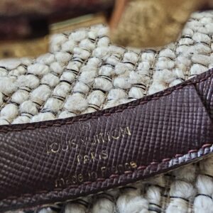 Louis Vuitton Paris made in France heat stamp on the burgundy leather lining of the Millennium Wish bracelet