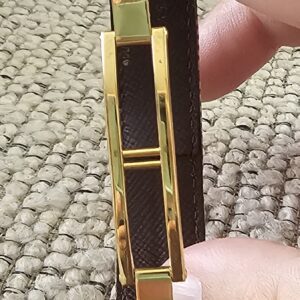 Louis Vuitton Millennium Wish bracelet held open showing the adjustable gold-tone fastening