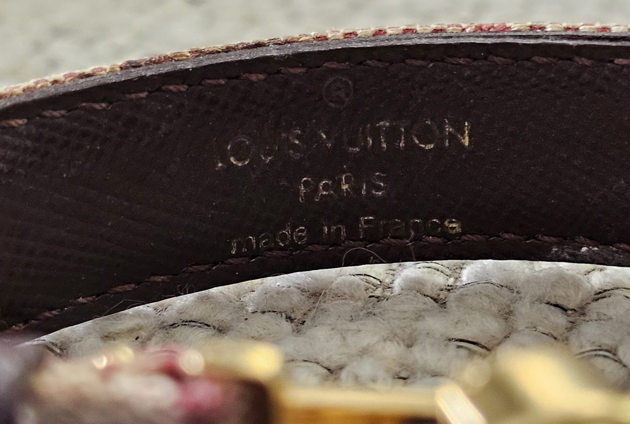 Close-up of the Louis Vuitton Paris made in France stamp inside the Millennium Wish bracelet
