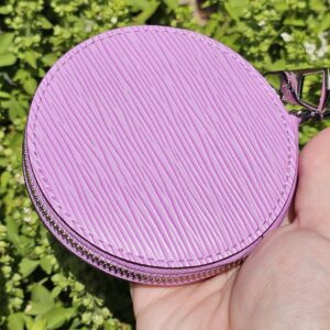 Front of the round purple Epi coin pouch included with the Louis Vuitton Marellini
