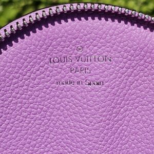 Louis Vuitton Paris made in Spain heat stamp inside the round Epi coin pouch