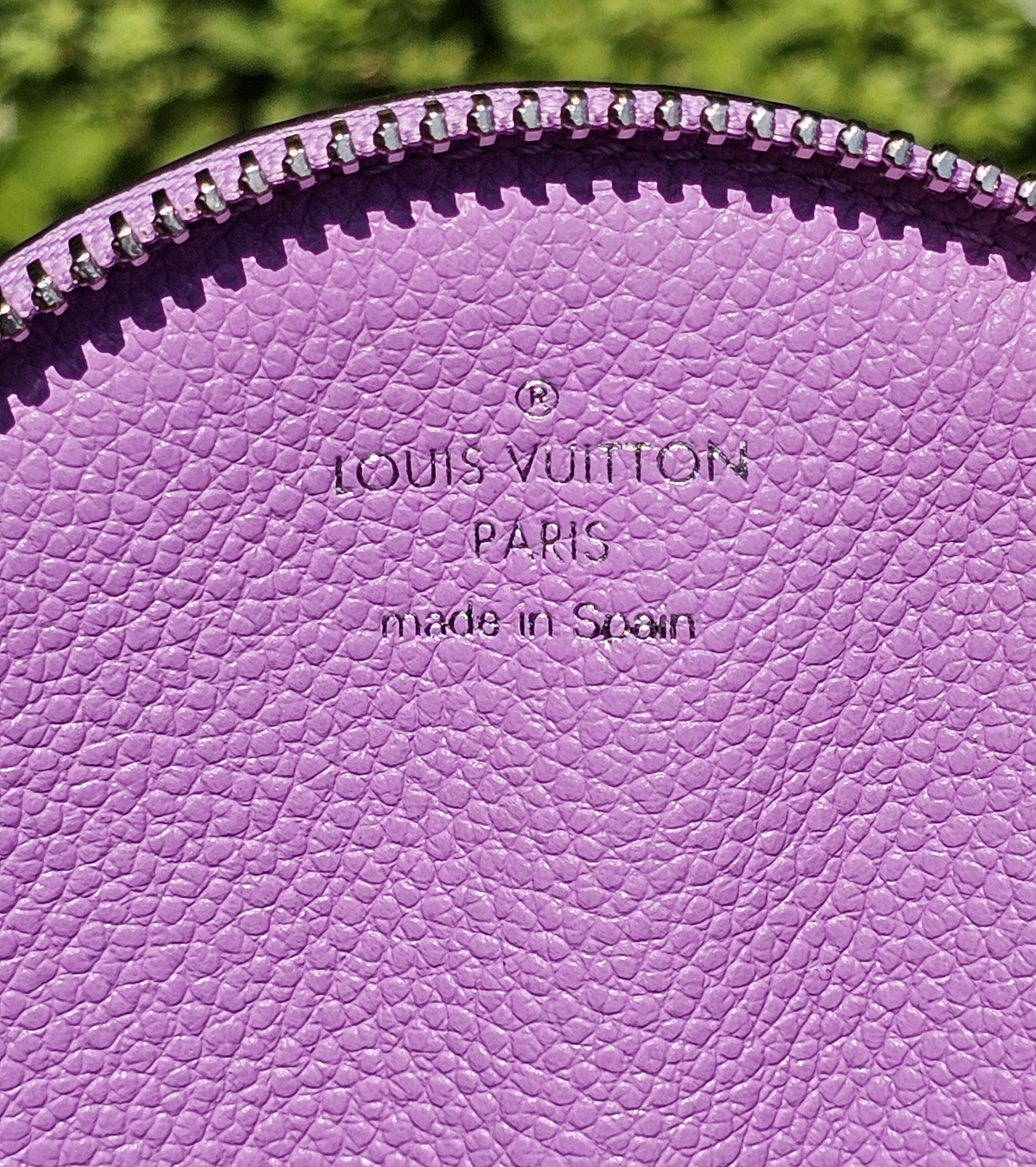 Louis Vuitton Paris made in Spain heat stamp inside the round Epi coin pouch