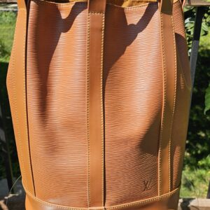 Front of the vintage Louis Vuitton Epi Randonnee PM in Cipango Gold leather