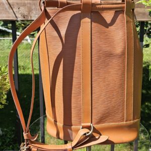 Leather shoulder straps of the Louis Vuitton Epi Randonnee PM backpack
