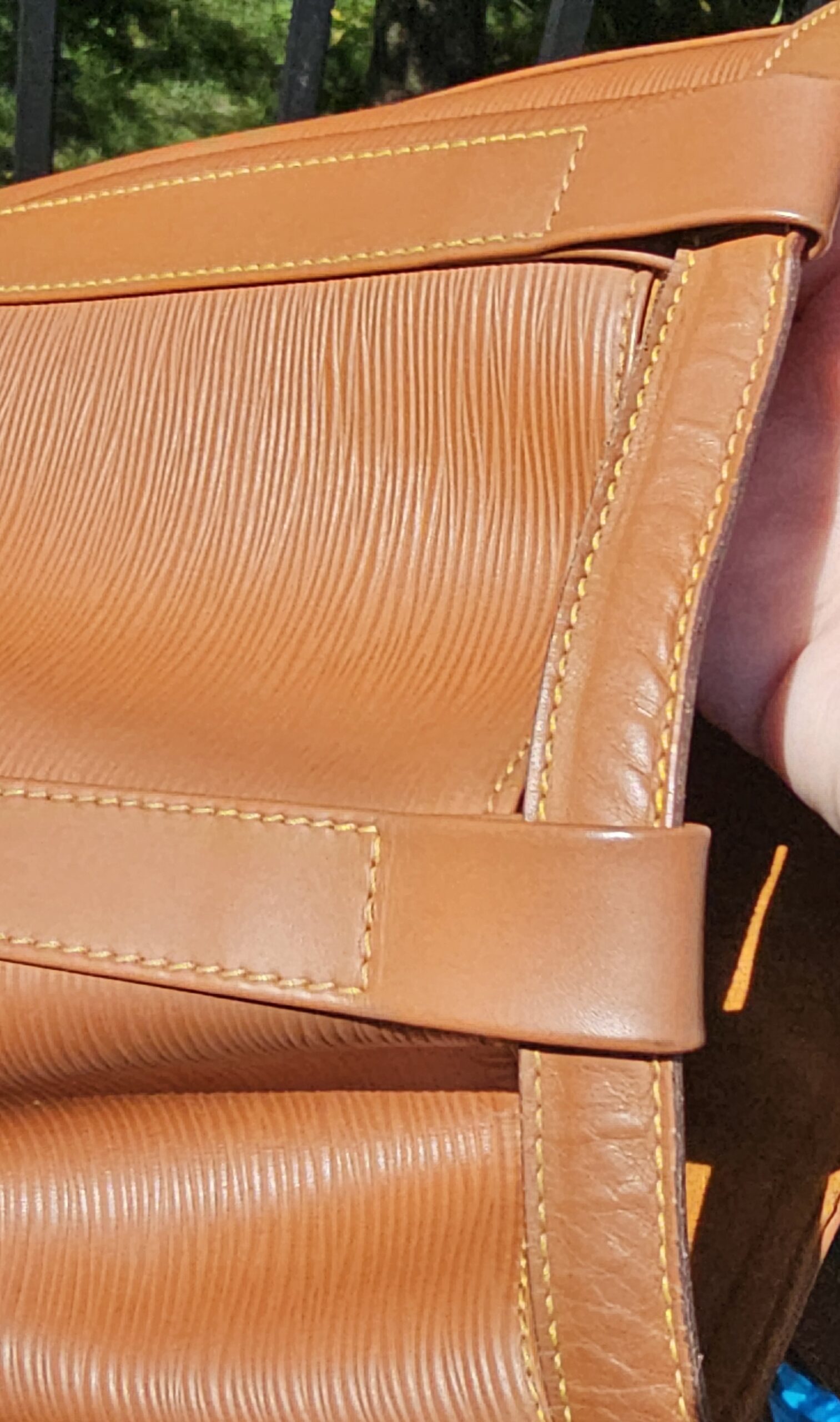 Close-up of the Cipango Gold Epi leather grain on the Louis Vuitton Randonnee PM