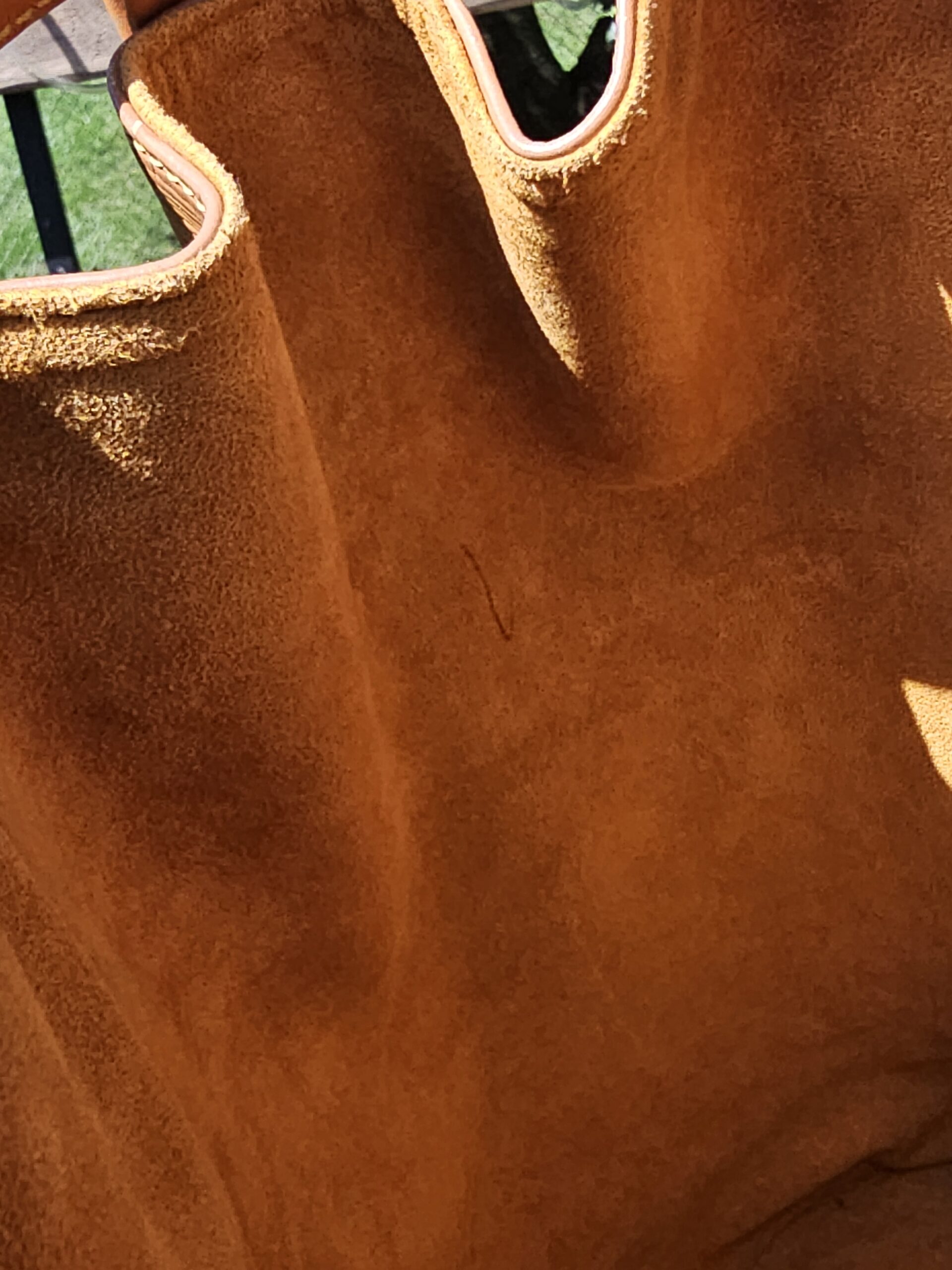 Brown Alcantara lining inside the Louis Vuitton Epi Randonnee PM