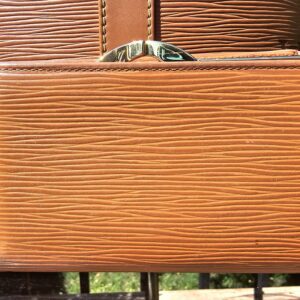 Back of the Louis Vuitton Epi kisslock wallet in Cipango Gold leather