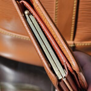Card slots inside the Louis Vuitton Epi kisslock wallet