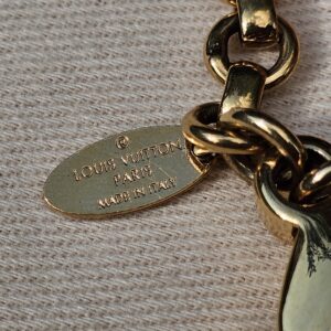 Louis Vuitton Paris made in Italy engraved plaque on the Insolence key holder and bag charm