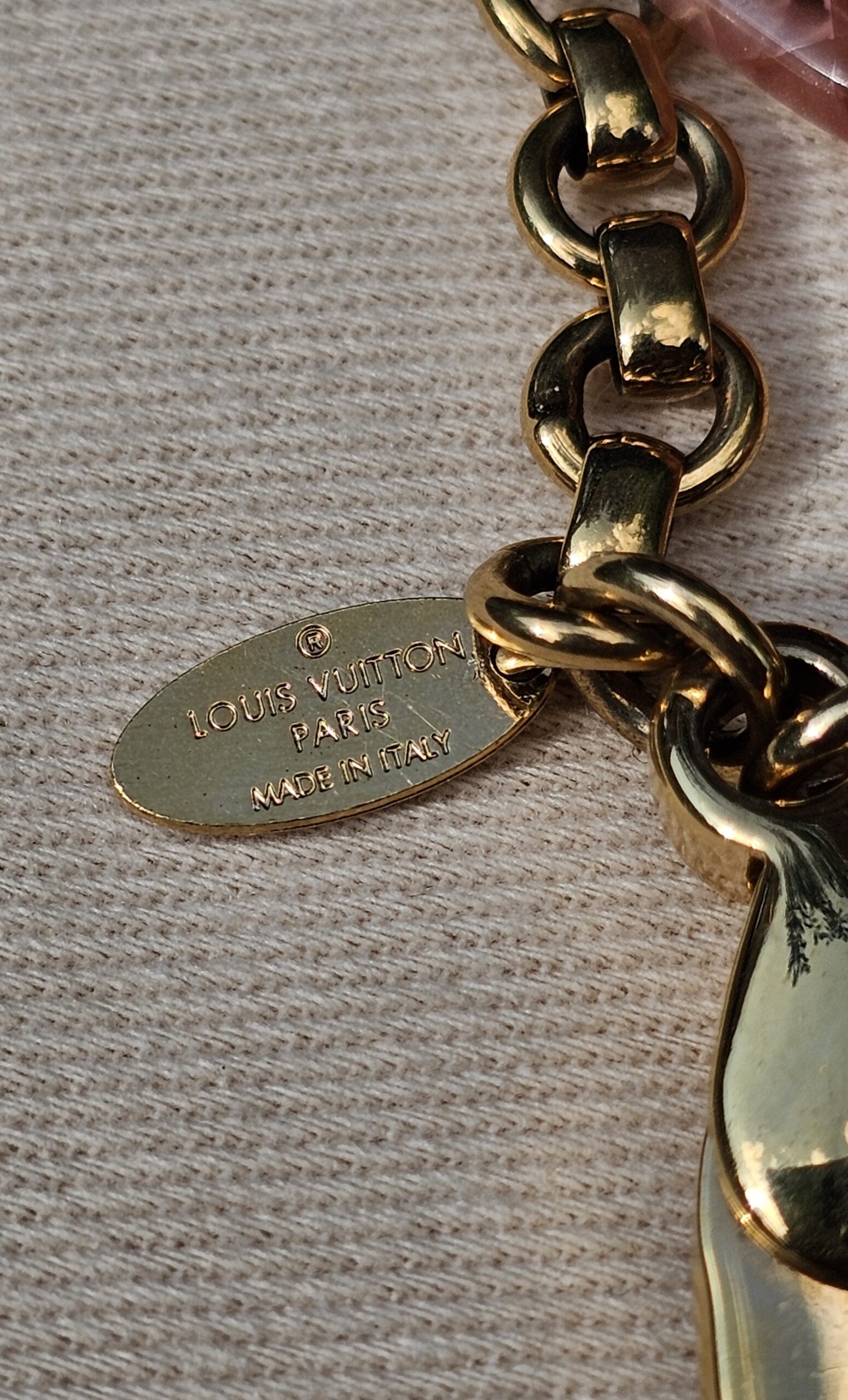 Louis Vuitton Paris made in Italy engraved plaque on the Insolence key holder and bag charm