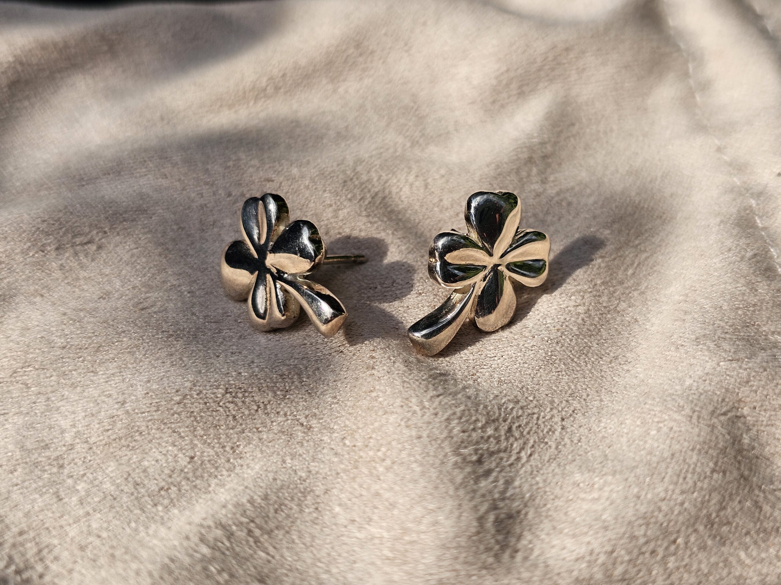 Pair of Chanel four leaf clover stud earrings in silver-tone metal