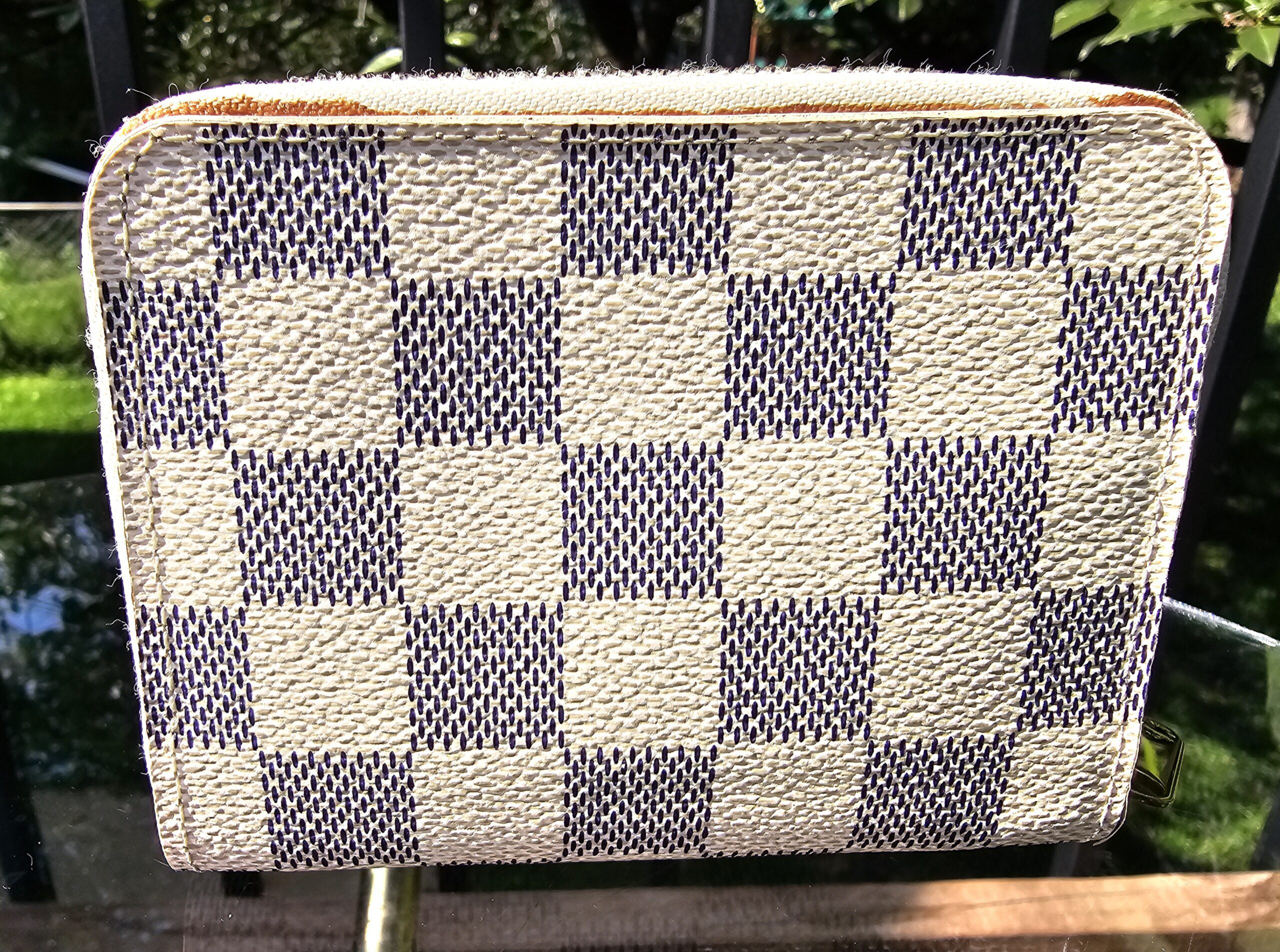 Back of the Louis Vuitton Damier Azur Zippy Coin Purse showing the checkered canvas