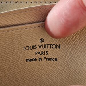 Louis Vuitton Paris made in France heat stamp inside the Damier Azur Zippy Coin Purse