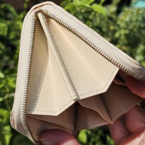 Louis Vuitton Damier Azur Zippy Coin Purse opened to show the accordion compartments