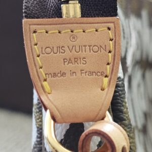 Louis Vuitton Paris made in France heat stamp on the vachetta strap tab of the Graffiti Pochette