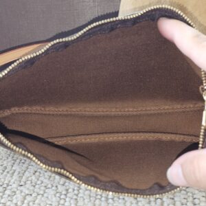 Brown textile interior of the Louis Vuitton Stephen Sprouse Graffiti Pochette Accessoires