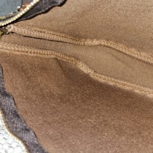 Louis Vuitton Graffiti Pochette Accessoires held open showing the interior