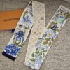Louis Vuitton Fontaines Parfumees silk bandeau in blue florals and gold Monogram, shown with its Louis Vuitton box