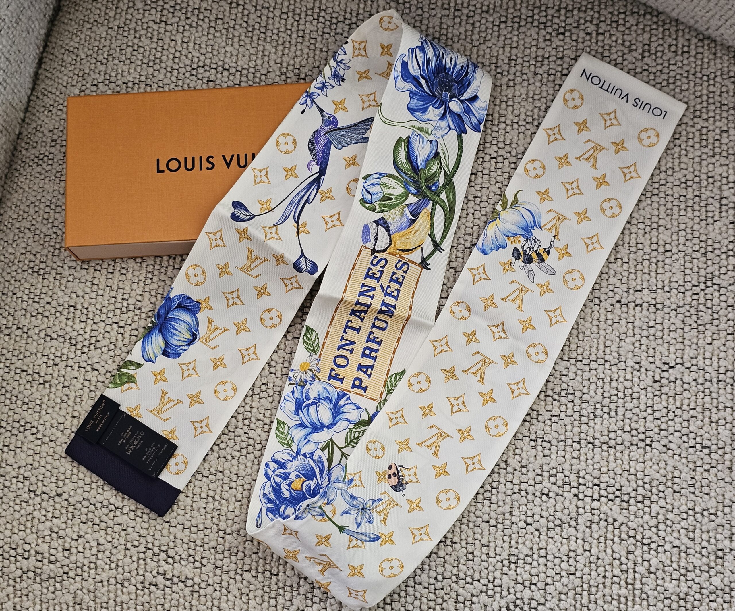 Louis Vuitton Fontaines Parfumees bandeau shown brand new with its tags still attached